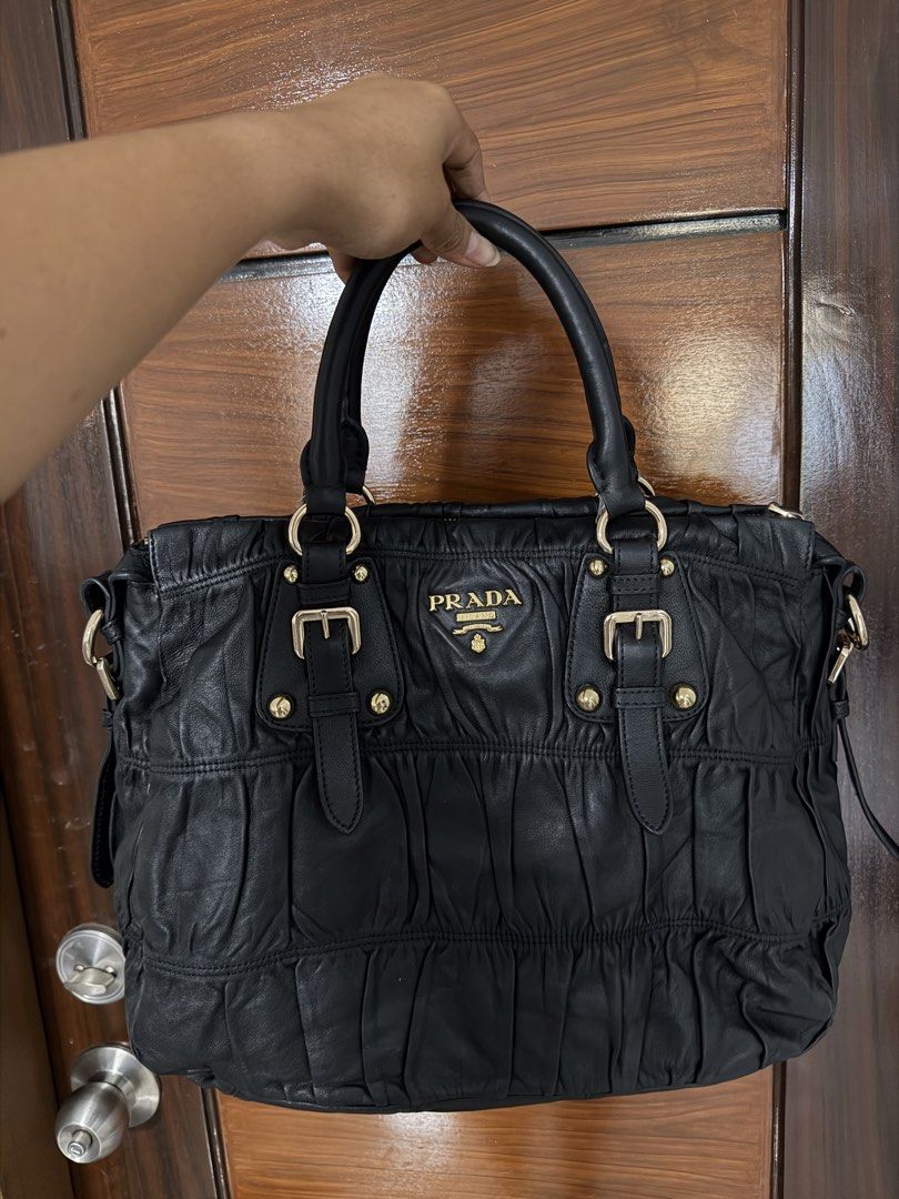 Prada Jacquard (Category: Luxury Bags & Wallets) located in Quezon City. Submitted by egptasiaco (Listing ID 1431682231, Image 1). Description: Selling my bag With authenticity card Money back guaranteed if proven fake All gold hard wares and good condition.