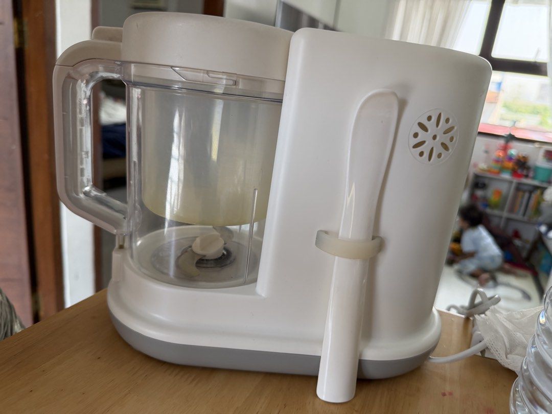 Precious Moments Multi-Function Food Processor PM 3608 (Category: Other Kitchenware & Tableware) located in Makati City. Submitted by dnomyerr (Listing ID 1431576276, Image 2). Description: - Precious Moments multi-function food processor. - Functions: Steam, boil, heat, and mix food. - 230ml water tank. - 400-watt steam function. - Includes blending bowl and handle. - Comes with manual instructions. - Ideal for preparing baby food..