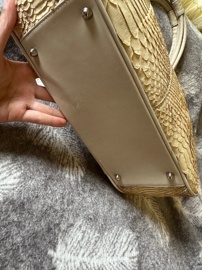 Python Skin Handbag (Category: Shoulder Bags) located in Pasig City. Submitted by passingpieces (Listing ID 1431669659, Image 3). Description: - Beige python skin handbag - Magnetic closure - issue sa bottom (check photo) accessory not included.