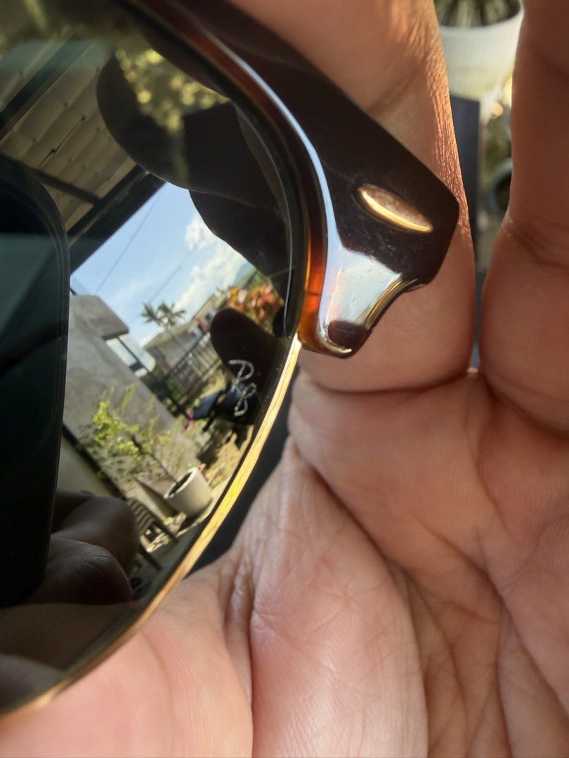 Ray-Ban Clubmaster (Category: Sunglasses & Eyewear) located in Cebu City. Submitted by ehdstuff (Listing ID 1431598173, Image 2). Description: The Ray-Ban RB3016 Clubmaster Classic is an iconic 1950s-inspired sunglass model. Known for its bold browline design, it features a dark or contrasting acetate upper frame with a thin metal lower rim. This model is widely recognized for its retro-intellectual aesthetic and has been a staple in both film an