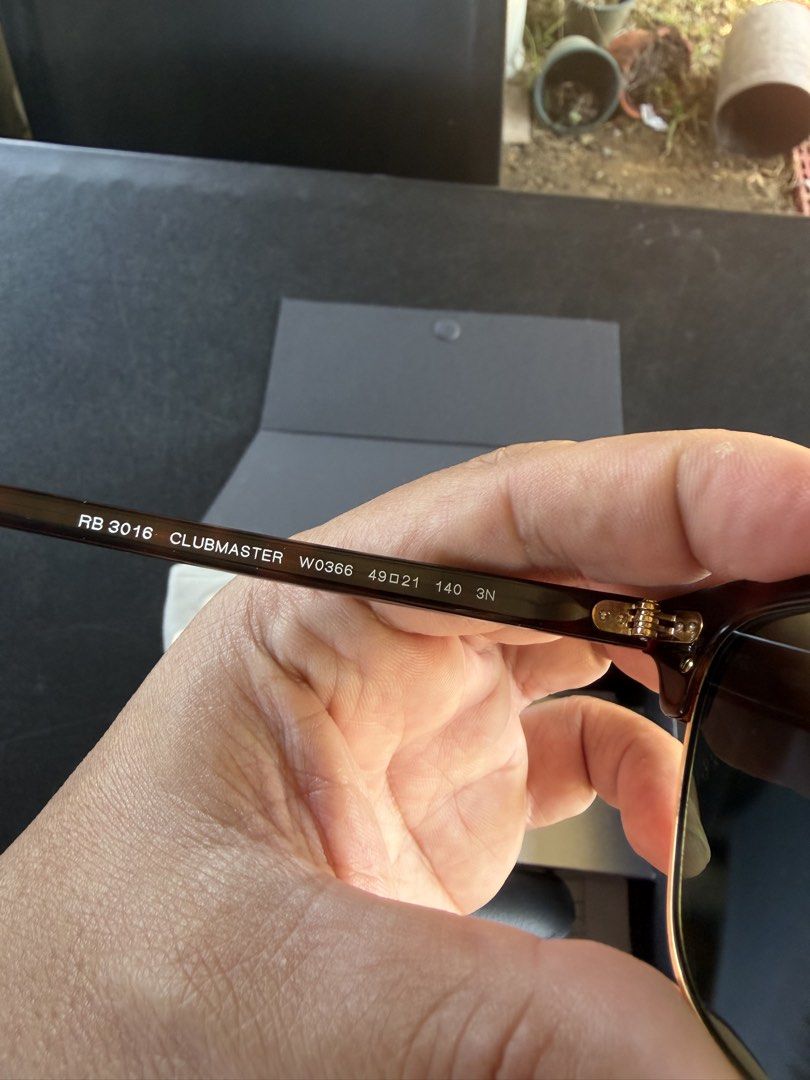 Ray-Ban Clubmaster (Category: Sunglasses & Eyewear) located in Cebu City. Submitted by ehdstuff (Listing ID 1431598173, Image 3). Description: The Ray-Ban RB3016 Clubmaster Classic is an iconic 1950s-inspired sunglass model. Known for its bold browline design, it features a dark or contrasting acetate upper frame with a thin metal lower rim. This model is widely recognized for its retro-intellectual aesthetic and has been a staple in both film an