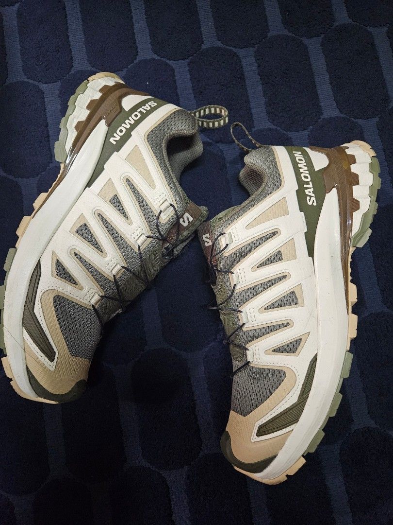 Salomon XA Pro 3D V9 Trail Running Shoes (Category: Sneakers) located in Valenzuela. Submitted by _myperfectstuff (Listing ID 1431648621, Image 2). Description: - Salomon XA Pro 3D V9 trail running shoes - Size: UK 8 / EUR 42 / US 8.5 / CN 260 - Quicklace system for easy adjustments - Ortholite insoles for comfort - Stylish multi-tone design (green, brown, beige) - Designed for grip and stability - Made in Vietnam.
