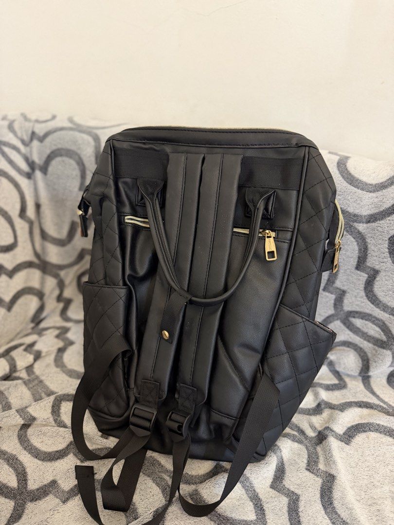sept SALE Secosana Black Quilted Backpack (Category: Backpacks) located in Rizal. Submitted by woof.and.meow (Listing ID 1431751676, Image 3). Description: SALE USED ONCE with some white spots due to storage but all good like new - Secosana black backpack - Stylish quilted design - Top handle and adjustable straps - Multiple compartments for organization - Front zippered pocket - Side pockets - Interior pockets - Elegant gold-toned hardware - Per