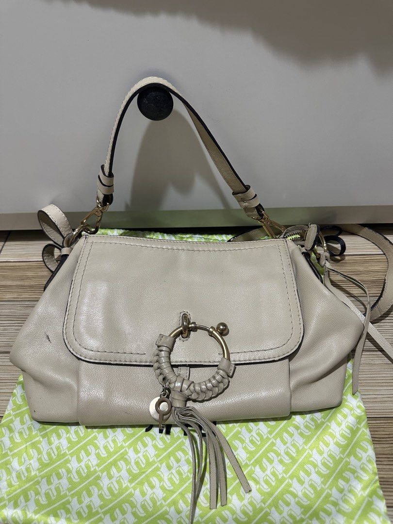 See by Chloe 2 way bag (Category: Luxury Bags & Wallets) located in Las Pinas. Submitted by jamila_zeth (Listing ID 1431644680, Image 1). Description: See by Chloe Joan bag. Can be worn as a shoulder and sling bag. Has visible flaws like leather marks on the bag as seen on the pics. Strap also has some cracks and hardware is also faded (see pics). All in all it’s still in a good working condition but with noticeable flaws. Measurement: 10.5” L x 