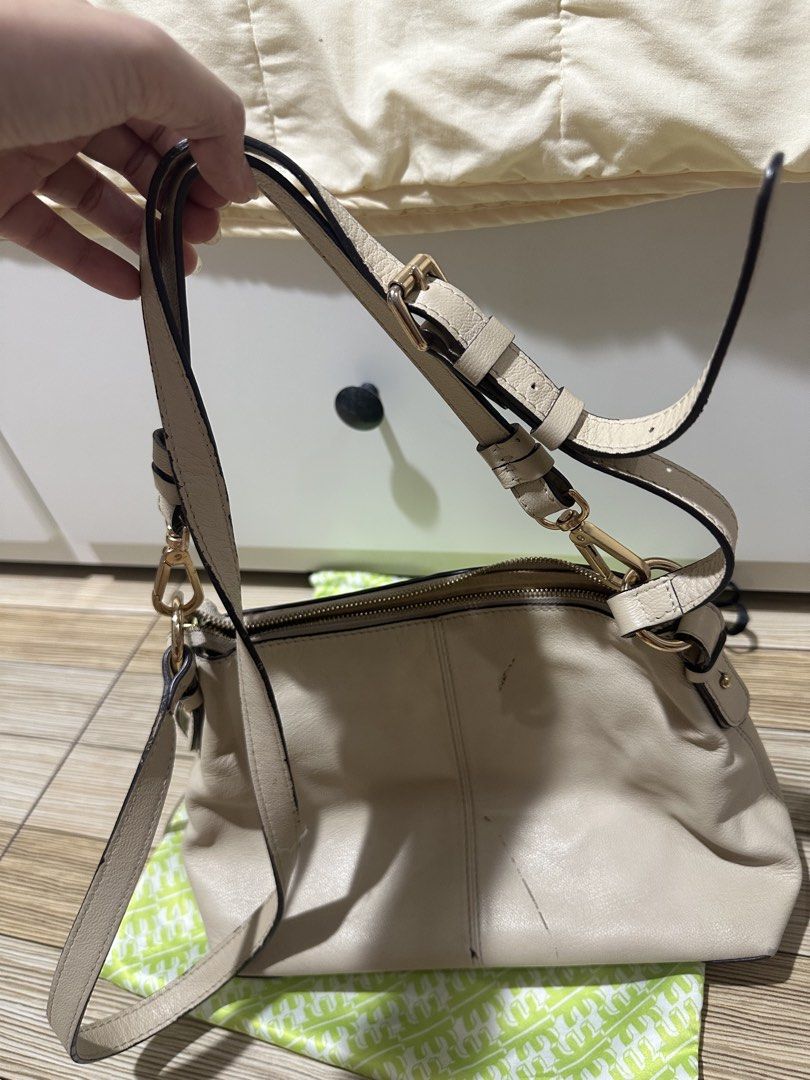 See by Chloe 2 way bag (Category: Luxury Bags & Wallets) located in Las Pinas. Submitted by jamila_zeth (Listing ID 1431644680, Image 3). Description: See by Chloe Joan bag. Can be worn as a shoulder and sling bag. Has visible flaws like leather marks on the bag as seen on the pics. Strap also has some cracks and hardware is also faded (see pics). All in all it’s still in a good working condition but with noticeable flaws. Measurement: 10.5” L x 