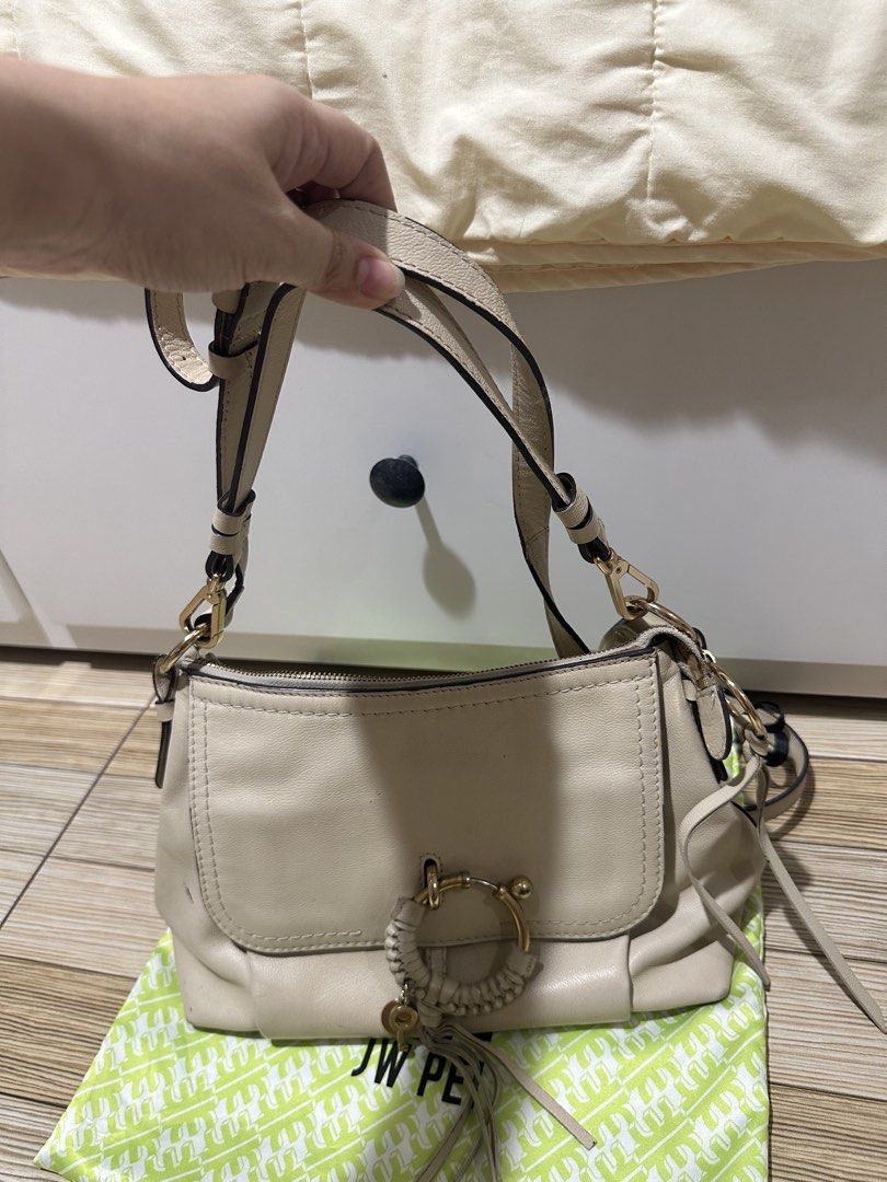 See by Chloe 2 way bag (Category: Luxury Bags & Wallets) located in Las Pinas. Submitted by jamila_zeth (Listing ID 1431644680, Image 2). Description: See by Chloe Joan bag. Can be worn as a shoulder and sling bag. Has visible flaws like leather marks on the bag as seen on the pics. Strap also has some cracks and hardware is also faded (see pics). All in all it’s still in a good working condition but with noticeable flaws. Measurement: 10.5” L x 