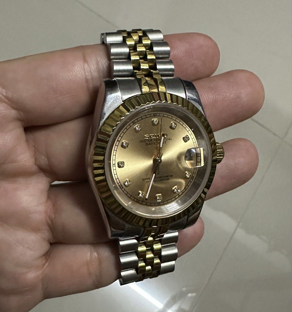 Seiko Oyster Perpetual Datejust Watch (Category: Luxury Watches) located in Pasig City. Submitted by clothesco.1289 (Listing ID 1431768831, Image 3). Description: SEIKO MOD - slightly used Excellent condition With box and extra links Date Two Tone Champagne Diamond - 6,500k plus sf Watch specifications Case Diameter - 36mm (can be 39mm) Case Material - 904L Steel Case Thickness - 12.5mm Crown - Screw down Case Back -Exhibition Style with scratch 