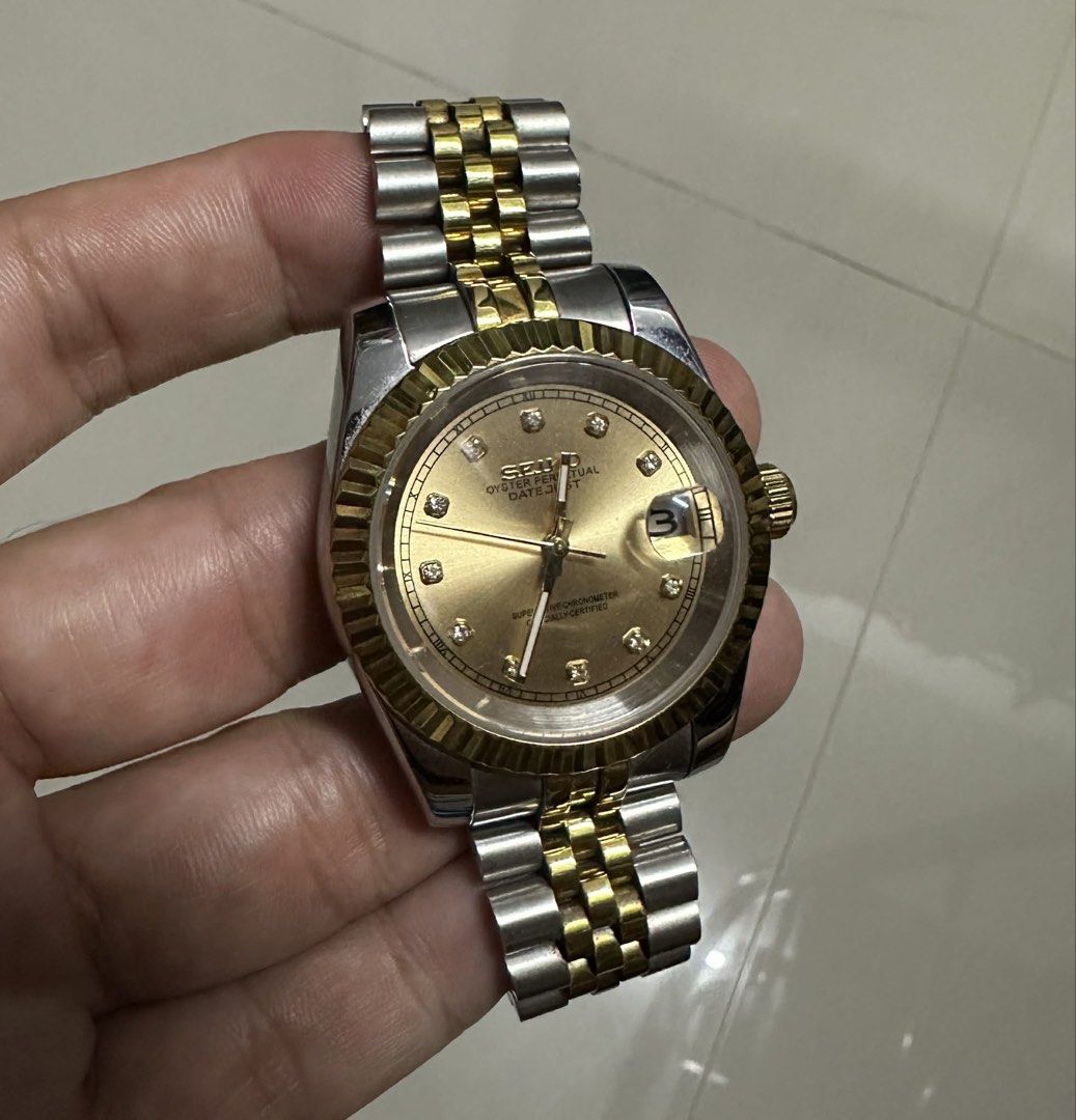 Seiko Oyster Perpetual Datejust Watch (Category: Luxury Watches) located in Pasig City. Submitted by clothesco.1289 (Listing ID 1431768831, Image 2). Description: SEIKO MOD - slightly used Excellent condition With box and extra links Date Two Tone Champagne Diamond - 6,500k plus sf Watch specifications Case Diameter - 36mm (can be 39mm) Case Material - 904L Steel Case Thickness - 12.5mm Crown - Screw down Case Back -Exhibition Style with scratch 