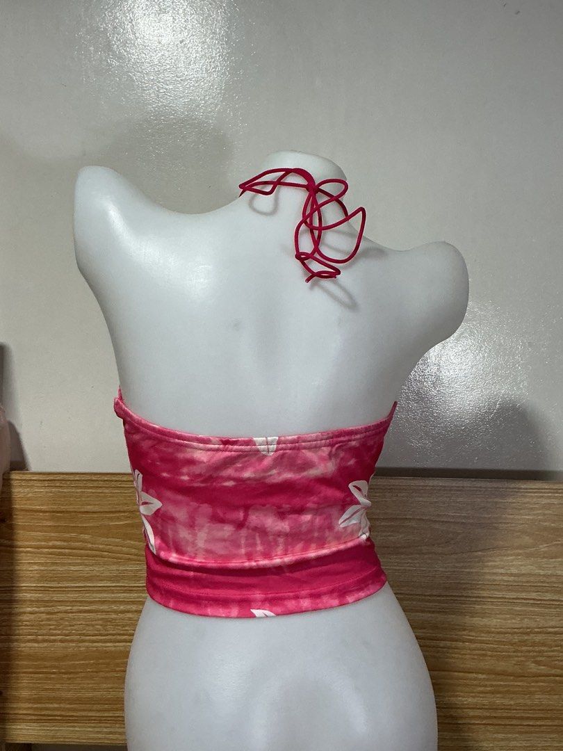 SHEIN Pink Floral Halter Top (Category: Sleeveless) located in Mandaluyong City. Submitted by fayemaure (Listing ID 1431624923, Image 3). Description: - Small to Medium! - Pink halter top - Floral design - Tie-up halter neck - Ruched bust - Soft, stretchy fabric - Great for a casual, summery look mannequin’s * bust: 32” * shoulder width: 15” * arm opening: 12” * waist: 24” * hips: 34” A MUST READ, BEFORE SHOPPING!! MOP: Gcash only (no cod) | cash