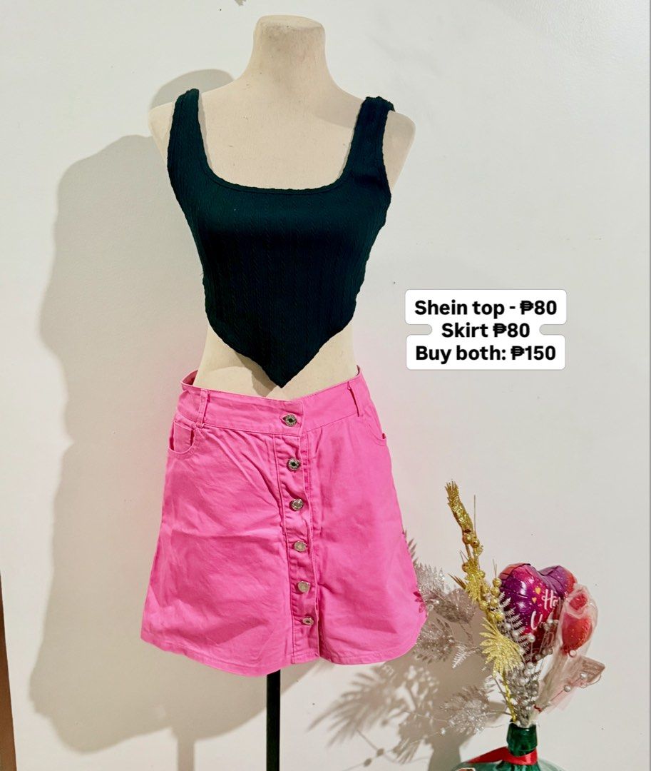 Shein Top and Pink Skirt Set (Category: Sets or Coordinates) located in Caloocan City. Submitted by dddddddddddeclutter (Listing ID 1431740596, Image 1). Description: - Shein top and skirt set - Top: Black, square-neck design - Skirt: Pink with button details - Prices: - Top: ₱80 - Skirt: ₱80 - Set: ₱150 - Perfect for casual or evening wear..