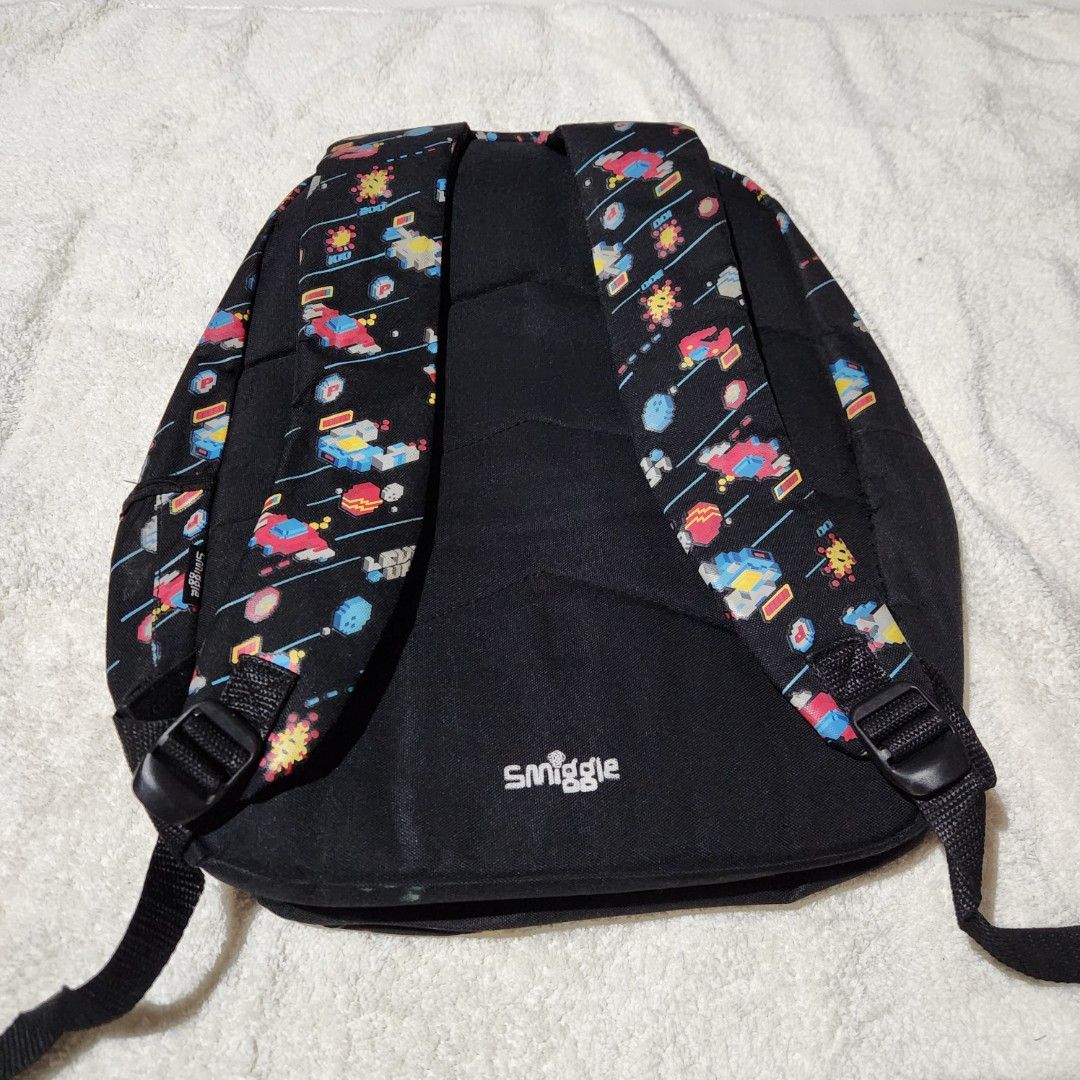 Smiggle Black Backpack (Category: Babies & Kids Fashion) located in Taguig. Submitted by sarisaristorebyks (Listing ID 1431760302, Image 2). Description: Original Flaws: Stains sa ilalim ng bag.