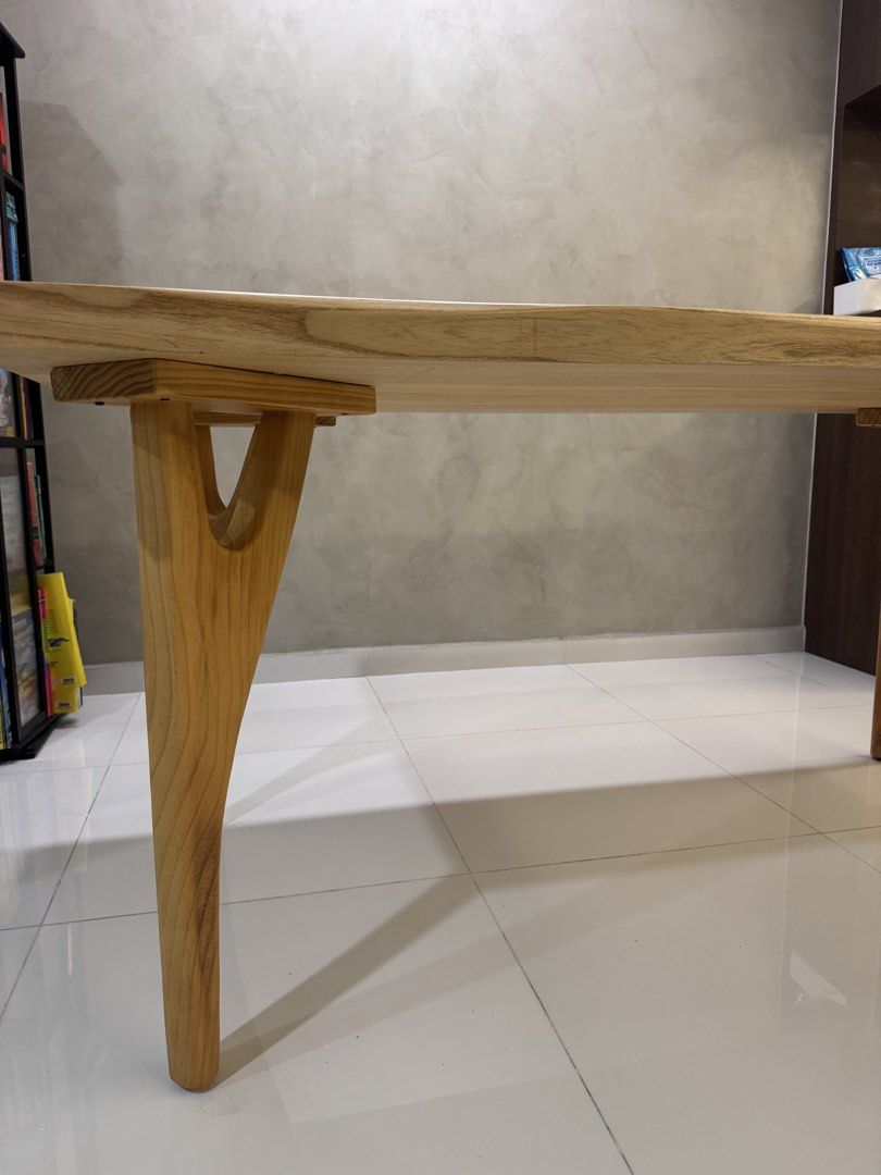 Solid Wood Dining Table (Category: Tables & Sets) located in Singapore. Submitted by randolf23 (Listing ID 1431573676, Image 3). Description: - Beautiful solid wood dining table - Unique leg design - Natural wood grain finish - Versatile use: dining or desk Specs: 5cm thick W85x L160xH75cm .
