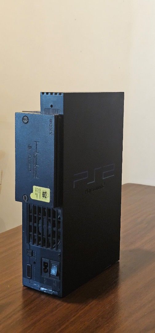 Sony PlayStation 2 Console (modified, 110v) (Category: PlayStation) located in Mandaluyong City. Submitted by limerick18 (Listing ID 1431631490, Image 2). Description: Selling 2nd hand modified PS2 console. Sold as-is. Inclusions: - Black PlayStation 2 console with 160GB HDD (Note: disc tray not working) -- FastHDBoot modified - 1 controller - AV Cable - PS2 to HDMI adapter (only works on some TV) - Memory Card - Transformer (110v) Power supply C