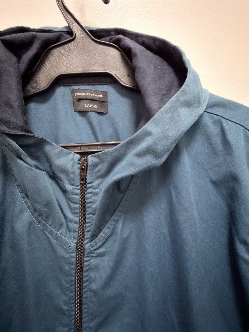 Straightforward Hooded Jacket - Large (Category: Coats, Jackets and Outerwear) located in Caloocan City. Submitted by nins___ (Listing ID 1431699844, Image 2). Description: - Blue hooded jacket - Size: Large - Full zip closure - Lightweight material - Darker blue hood - Classic design - Suitable for layering - Used but not abused. Delivery fee will be shouldered by the BUYER..