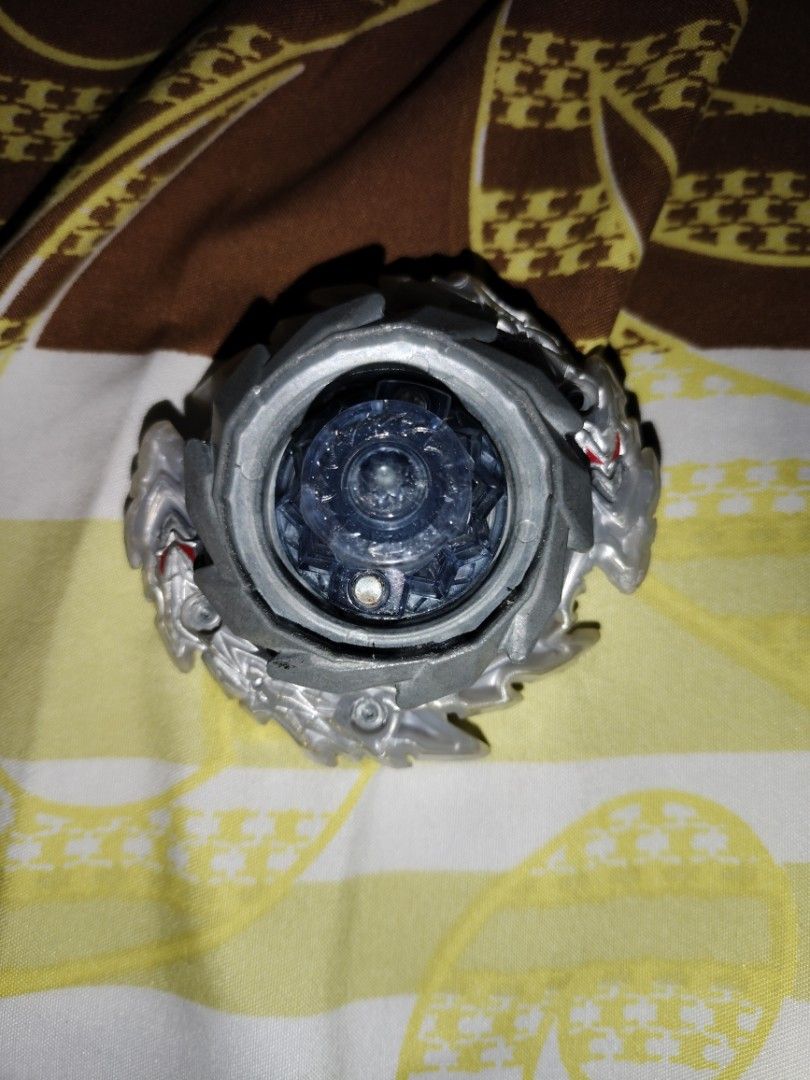 Takara tomy Guilty Longinus beyblade burst (Category: Action & Battle Toys) located in Manila. Submitted by jawaje67 (Listing ID 1431750266, Image 2). Description: a little yellowing but barely noticeable, still in good condition (just missing stickers).