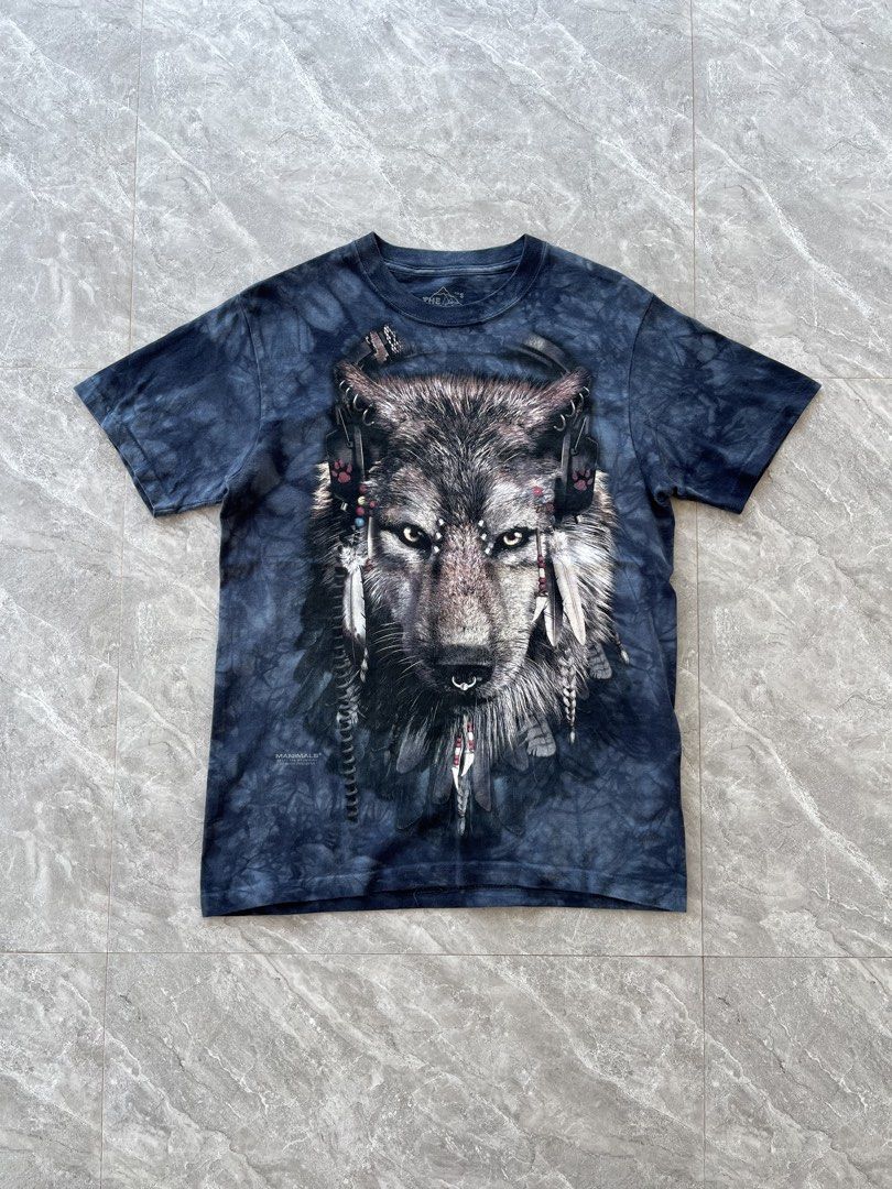 The Mountain Wolf T-shirt - Size S (Category: Tshirts & Polo Shirts ) located in Dagami. Submitted by donsthrift (Listing ID 1431583457, Image 1). Description: - The Mountain t-shirt - Size: Small - Design: Wolf graphic with feathers and tribal elements - Material: Cotton - Neckline: Crew neck - Made in USA/Mexico W:19 L:27.