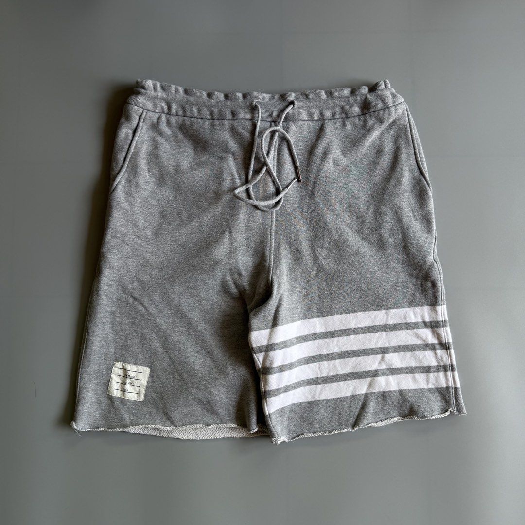 Thom Browne New York Shorts Size 4 (Category: Luxury Apparel) located in Benito Soliven. Submitted by markedasdifferent (Listing ID 1431673067, Image 1). Description: THOM BROWNE ADJUSTABLE WAIST 20L 12H ALTERED LENGTH.