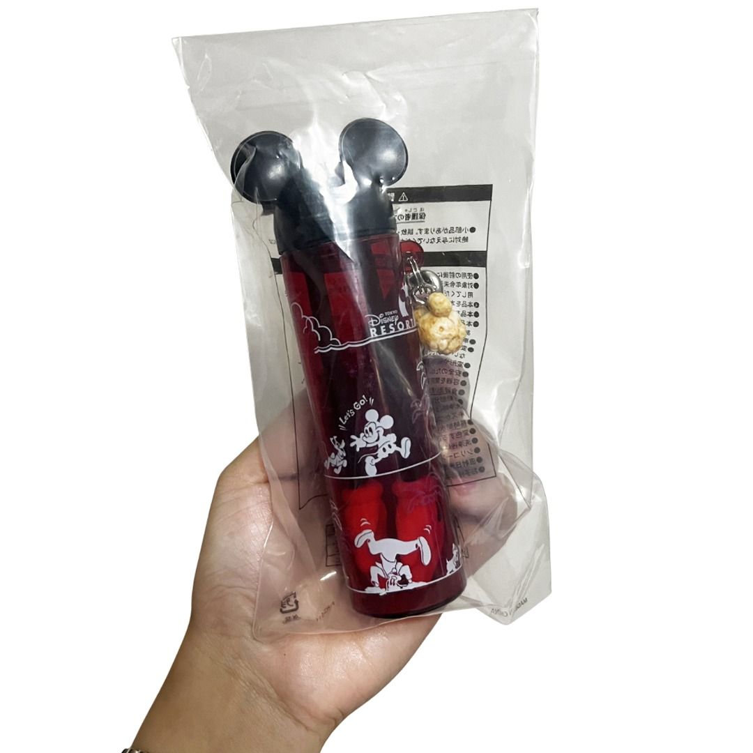 TOKYO DISNEY Popcorn Tongs (Category: Character Goods) located in Quezon City. Submitted by declutter_to_downsize (Listing ID 1431683422, Image 2). Description: This item is a collectible Tokyo Disney Resort souvenir popcorn tong featuring Mickey Mouse hands. - It is a popular and functional souvenir designed to keep fingers clean while eating popcorn or snacks. - The tongs are often sold with a protective container for storage. - These items are