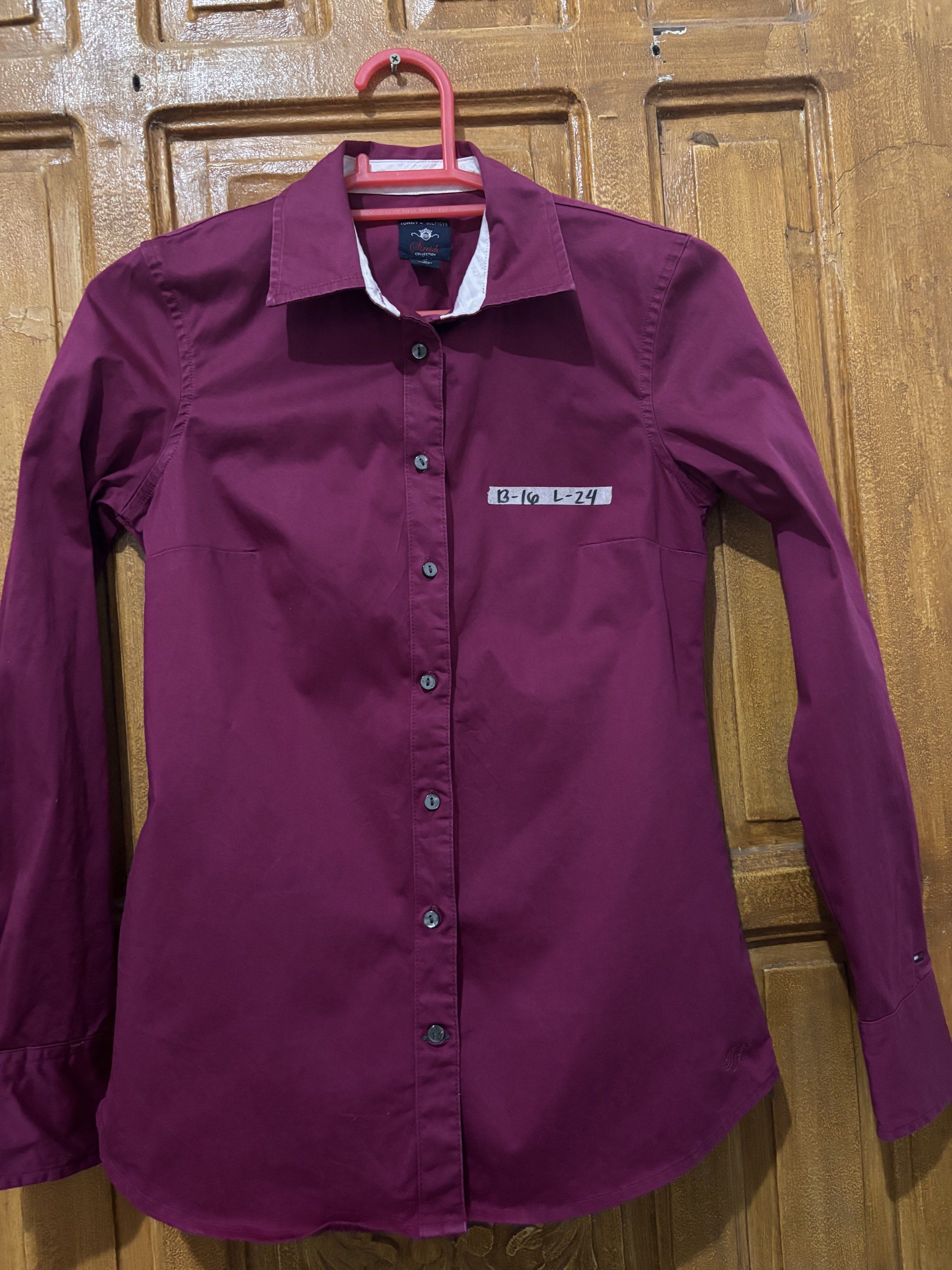 Tommy Hilfiger Long Sleeve Shirt (Category: Longsleeves) located in Cavite. Submitted by clawsetangelaco (Listing ID 1431653678, Image 2). Description: • Brand: Tommy Hilfiger • Fabric: Cotton Stretch (Stretch Collection) • Color: Magenta / Deep Plum • Size: Small (Bust: 16” | Length: 24”) • MOP: Gcash only (Free SF) • Shipment: Weekend Shipment only.
