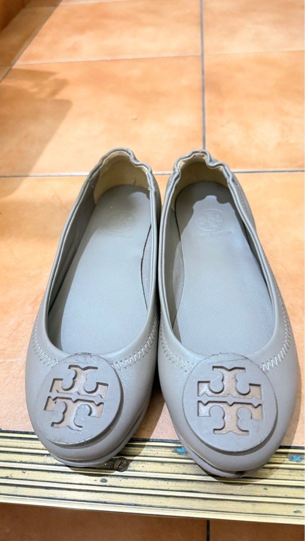 Tory Burch Flats (Category: Flats & Sandals) located in Makati City. Submitted by assorted_items88 (Listing ID 1431575774, Image 2). Description: ✨ Size 35–35.5 ONLY – for petite/small feet Worn once only. Premium copy of Tory Burch flats in taupe / gray-beige. • Size: EU 35.5 • Condition: Almost new (used once) • With minor dents/creases due to storage (see photos) • No major damage, still very wearable Elegant neutral color—easy to match with a