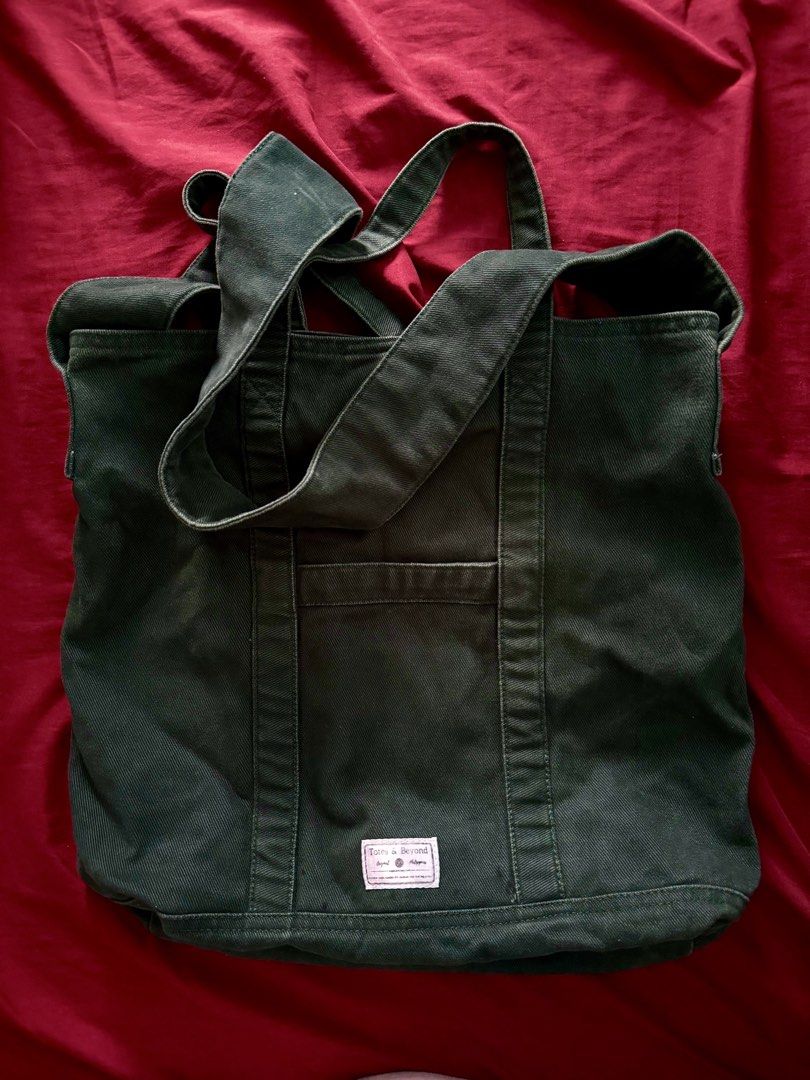 Totes & Beyond Tote Bag (Moss Green) (Category: Tote Bags) located in Quezon City. Submitted by assdeclutters (Listing ID 1431594897, Image 1). Description: Light discoloration visible due to washing. Still in good condition! Not using it anymore..