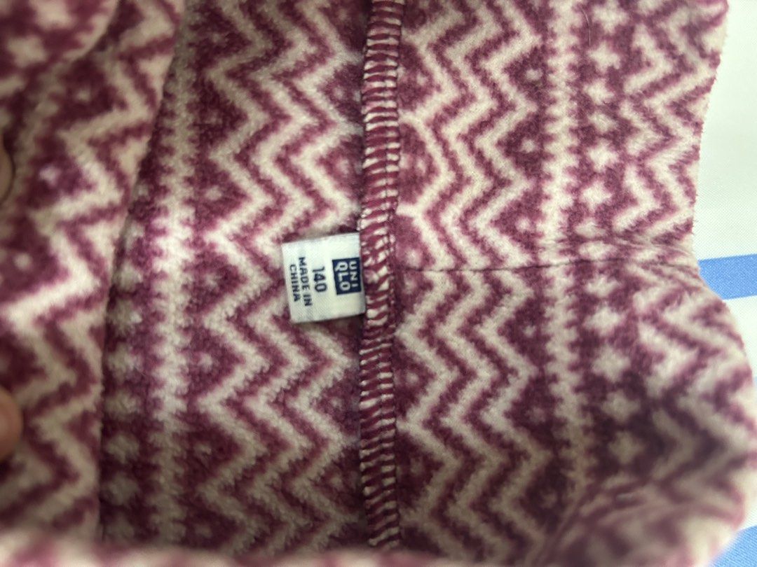 Uniqlo Fleece Sweater (Category: Coats, Jackets and Outerwear) located in Pasig City. Submitted by zealcloud-49c8cd (Listing ID 1431753574, Image 3). Description: - Size: 140 - RFS: Decluttering, too small - Condition: lightly used Price isnt final, haggling allowed. Please just send message and offer 😊.