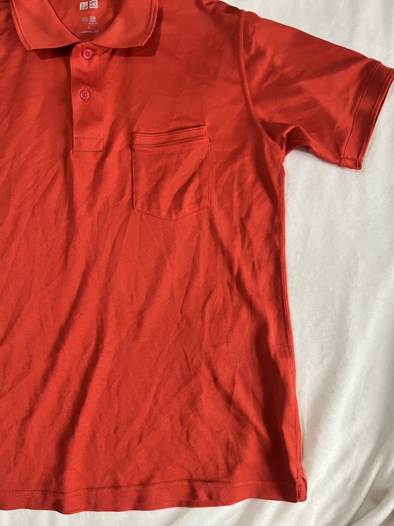 Uniqlo Red Polo Shirt (Category: Tshirts & Polo Shirts ) located in Mandaluyong City. Submitted by mandmclosey_ (Listing ID 1431661288, Image 3). Description: - Uniqlo Polo Shirt - Vibrant red color - Size: L - Features: - Classic polo collar - Chest pocket - Short sleeves - Button-up placket - Measurements: - Length: 16 inches - Width: 19 inches - Sleeve Hole: 6 inches - Versatile for casual wear. - never been worn!! Loc: Mandaluyong City Mode o