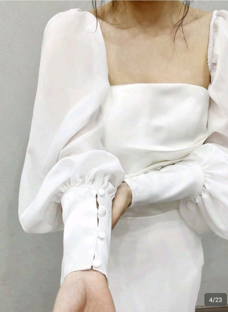 White Puff Sleeves (Category: Dresses) located in Quezon City. Submitted by cdm19 (Listing ID 1431789274, Image 3). Description: - Long puff sleeves - Fitted bodice - Straight skirt - Buttoned cuffs - Satin-like fabric - Ideal for special occasions.