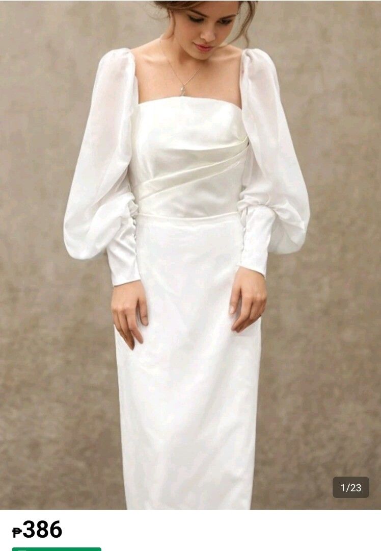 White Puff Sleeves (Category: Dresses) located in Quezon City. Submitted by cdm19 (Listing ID 1431789274, Image 1). Description: - Long puff sleeves - Fitted bodice - Straight skirt - Buttoned cuffs - Satin-like fabric - Ideal for special occasions.