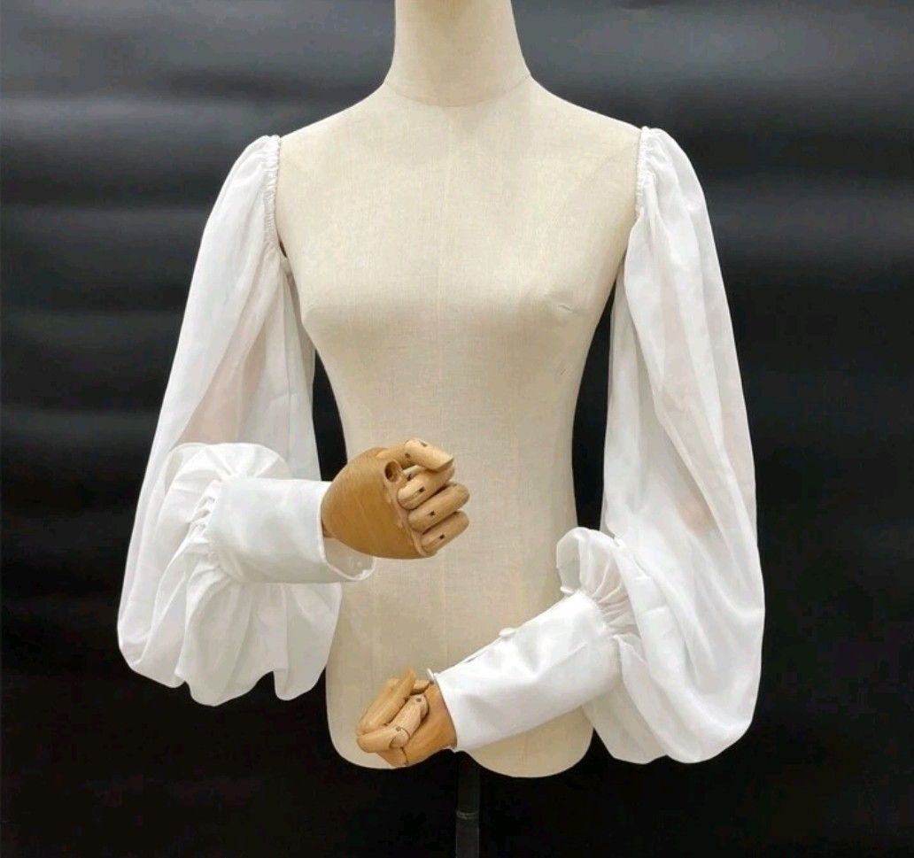 White Puff Sleeves (Category: Dresses) located in Quezon City. Submitted by cdm19 (Listing ID 1431789274, Image 2). Description: - Long puff sleeves - Fitted bodice - Straight skirt - Buttoned cuffs - Satin-like fabric - Ideal for special occasions.