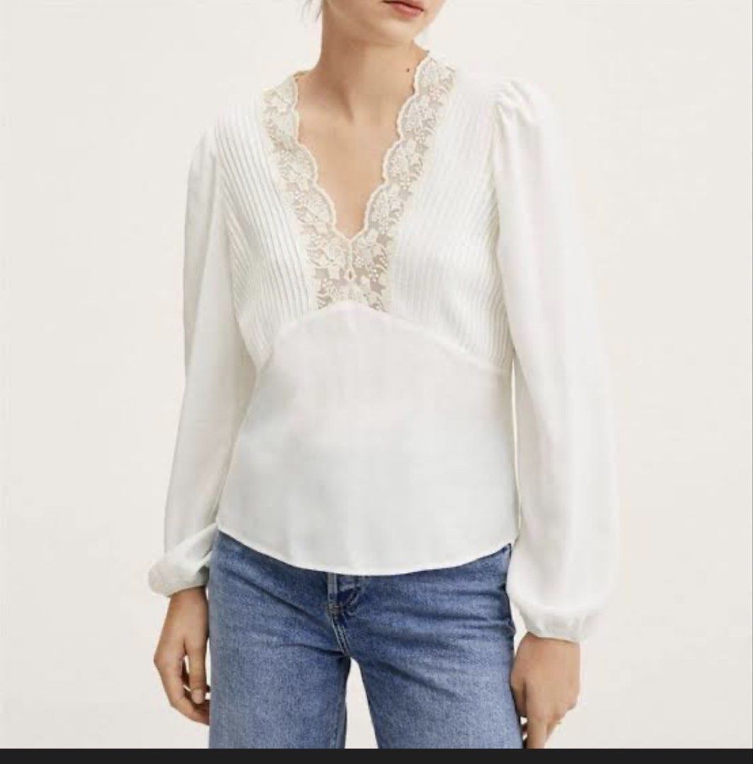 white flowy blouse lace longsleeves (Category: Blouses) located in Cainta. Submitted by audieu (Listing ID 1390307477, Image 1). Description: bought from mango podium white lace kinda silk material longsleeves fits xs-small rfs: never worn, not my style.