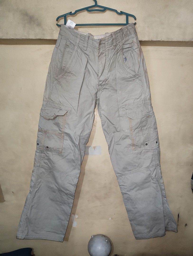 Y2K Cargo Pants (Category: Trousers) located in Manila. Submitted by joernc (Listing ID 1431619047, Image 1). Description: North Coast Cargo Pants Condition: Used Color Rate: 7/10 Size: 30 Dimes: 30 x 38 9 Leg opening Issues: Stains 200.