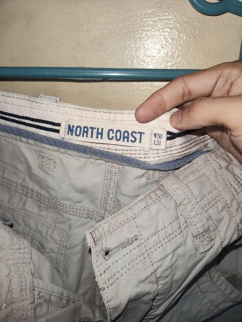 Y2K Cargo Pants (Category: Trousers) located in Manila. Submitted by joernc (Listing ID 1431619047, Image 2). Description: North Coast Cargo Pants Condition: Used Color Rate: 7/10 Size: 30 Dimes: 30 x 38 9 Leg opening Issues: Stains 200.