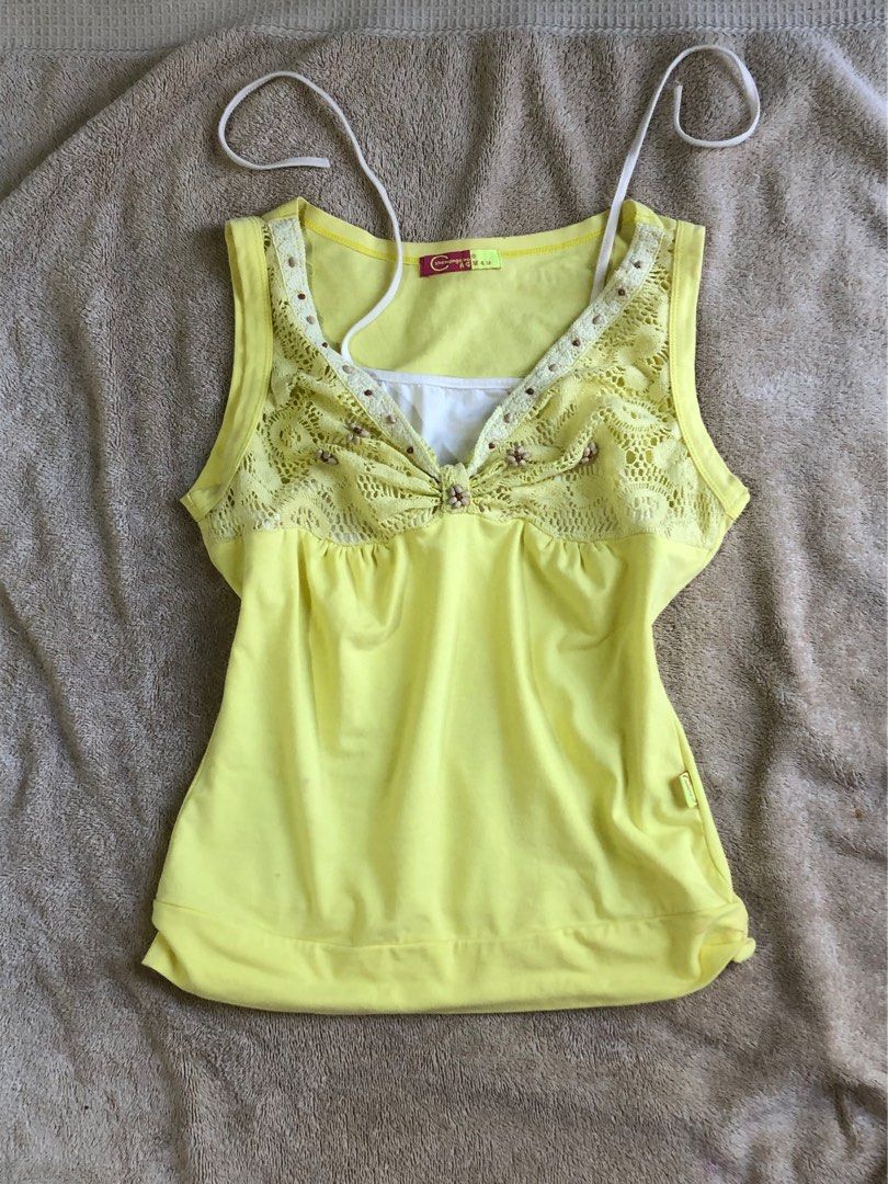 Yellow Flowy Summer Cami Top (Lace Front Design) (Category: Others Tops) located in Bulacan. Submitted by kellythrifts (Listing ID 1431657052, Image 1). Description: Type: Sleeveless cami / top Color: Vibrant yellow Details: Lace front panel with bead accents Fit: Flowy and comfy Straps: Adjustable Condition: (brand new) Size: S - M Material: Lightweight and breathable ✨ Perfect for casual wear, summer outfits, or layering! 📌 RFS: Decluttering �