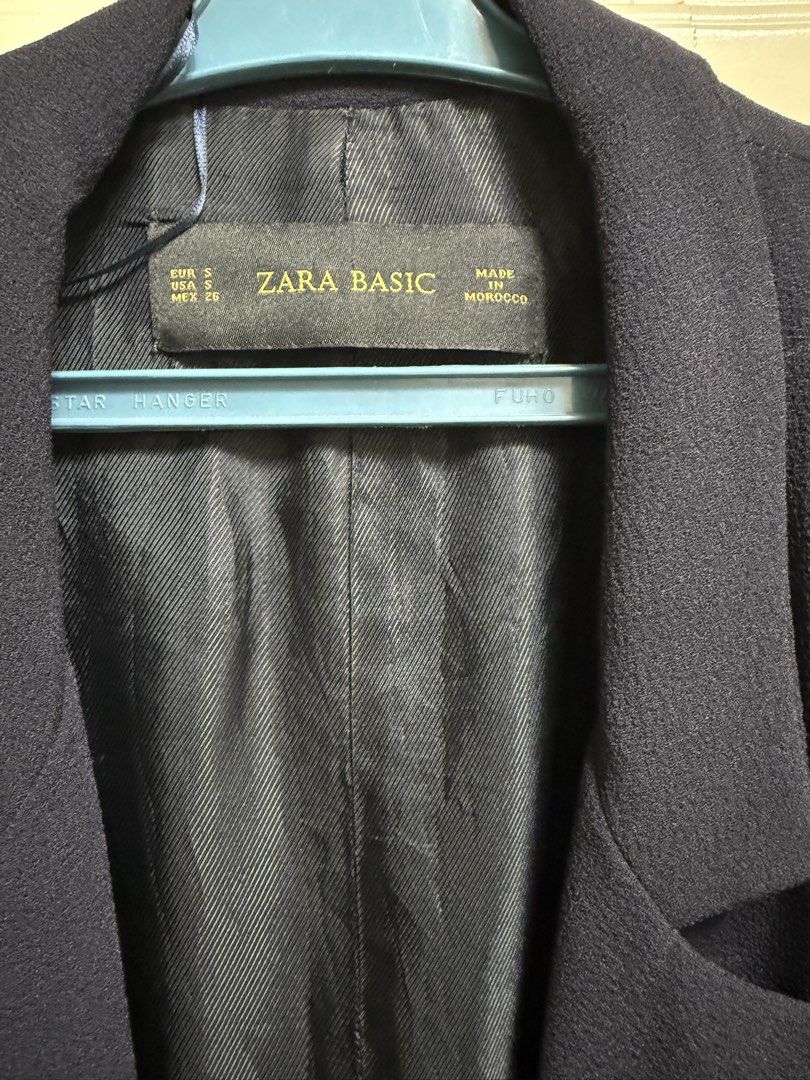 Zara Basic Navy Blazer (Category: Coats, Jackets and Outerwear) located in Quezon City. Submitted by declutter1ngmama (Listing ID 1431587857, Image 3). Description: - Zara Basic navy blazer - Classic design - Notched lapel - Two front pockets - Three-quarter sleeves - Relaxed fit - Size: S (EUR), 26 (MEX) - Made in Morocco Blazer length : 30”.