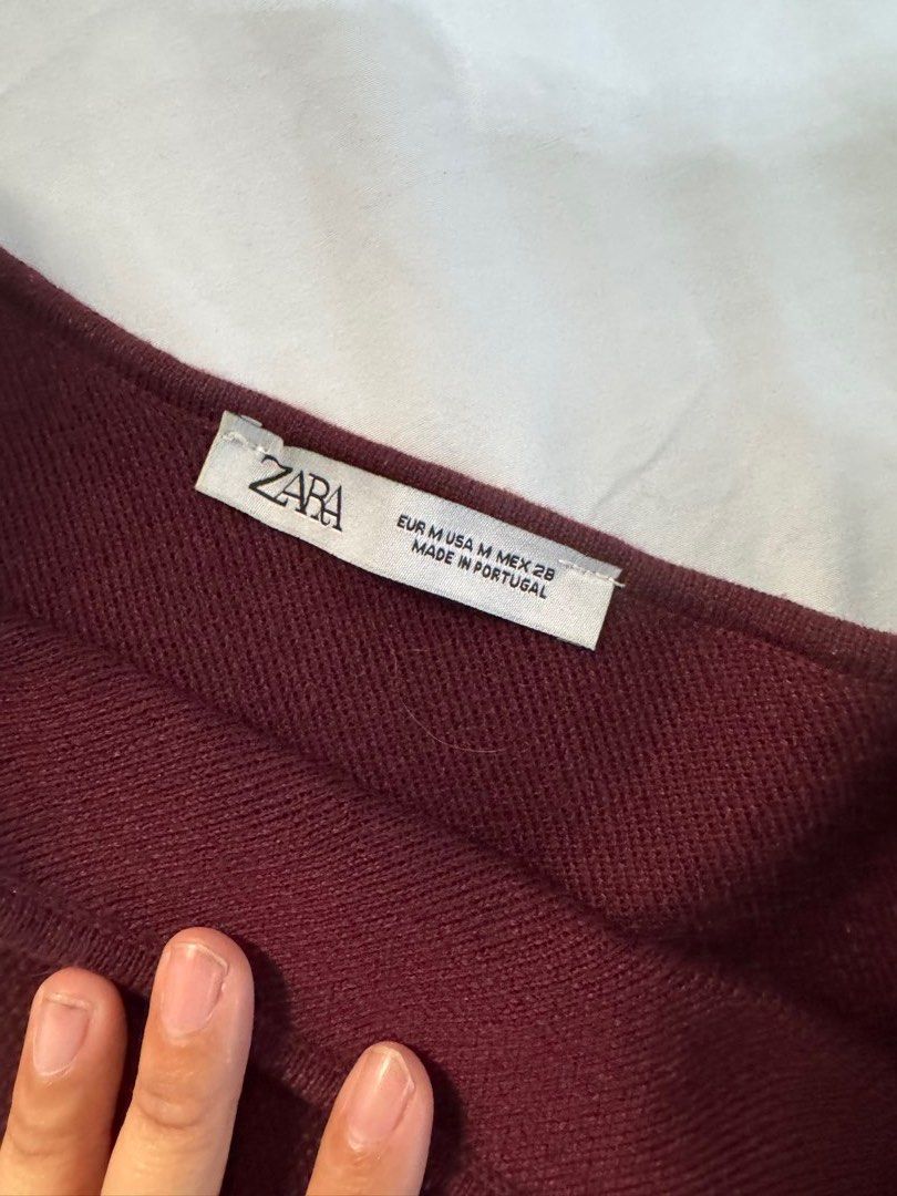 Zara Maroon Sweater (Category: Longsleeves) located in Manila. Submitted by raphaelain17296 (Listing ID 1431736874, Image 3). Description: - Zara maroon sweater - Asymmetrical design - One long sleeve - Size M - Made in Portugal - Versatile style.