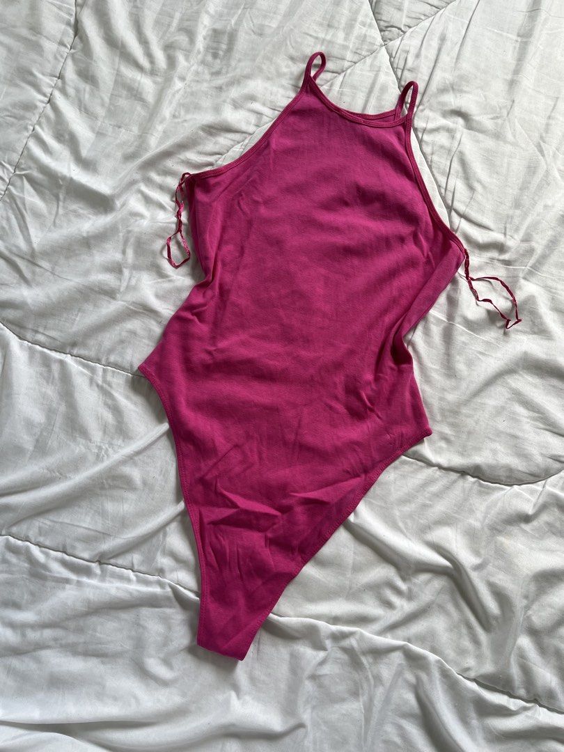 Zara Pink High Neck Halter Bodysuit (Category: Others Tops) located in Cavite. Submitted by siyaara (Listing ID 1431603684, Image 1). Description: - Zara pink bodysuit - Halter neckline with spaghetti straps - Thong back - Size tag visible - Perfect for layering or wearing alone - Good for this summer outfit! - No issues .