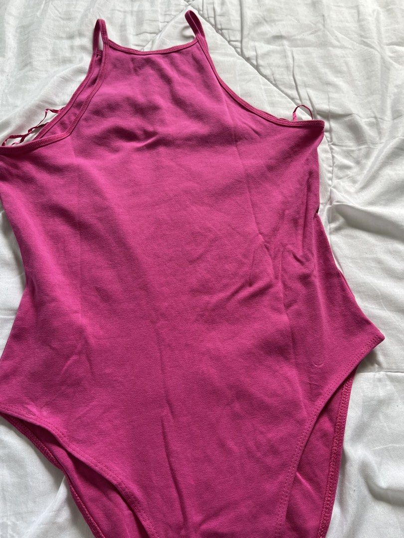 Zara Pink High Neck Halter Bodysuit (Category: Others Tops) located in Cavite. Submitted by siyaara (Listing ID 1431603684, Image 3). Description: - Zara pink bodysuit - Halter neckline with spaghetti straps - Thong back - Size tag visible - Perfect for layering or wearing alone - Good for this summer outfit! - No issues .