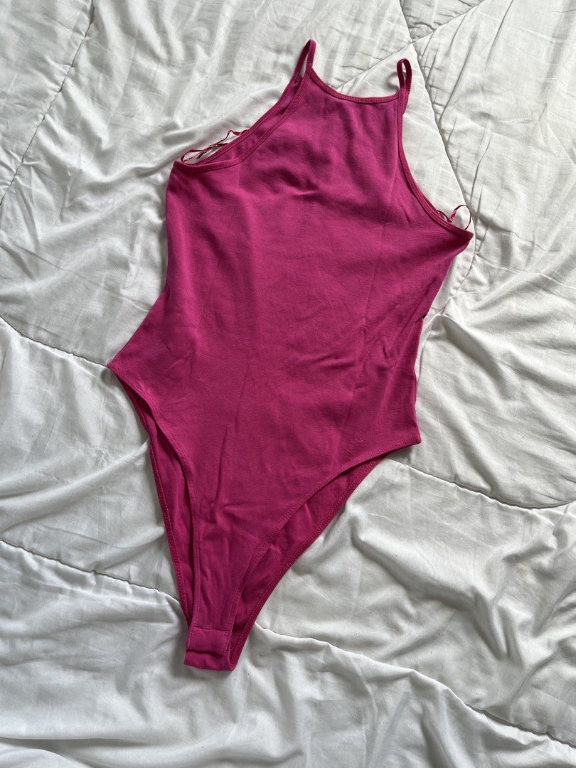 Zara Pink High Neck Halter Bodysuit (Category: Others Tops) located in Cavite. Submitted by siyaara (Listing ID 1431603684, Image 2). Description: - Zara pink bodysuit - Halter neckline with spaghetti straps - Thong back - Size tag visible - Perfect for layering or wearing alone - Good for this summer outfit! - No issues .