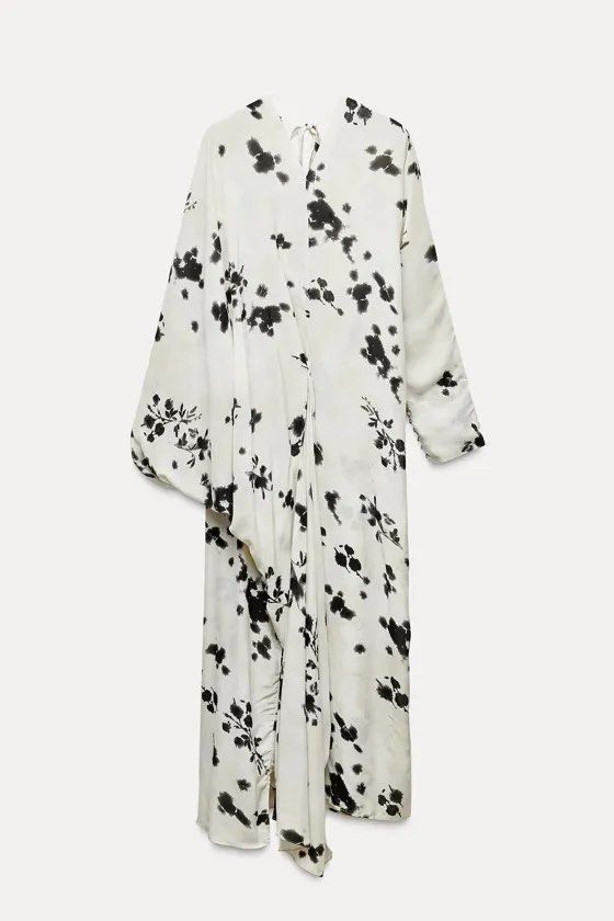 Zara Printed Dress XS (Category: Dresses) located in Santa Rosa. Submitted by a.i.b. (Listing ID 1431582749, Image 2). Description: - Zara maxi dress - Size: XS - Color: Cream with black floral print - Features: Long sleeves, tie back detail, button closure on sleeve cuffs - Condition: New with original price tag (USD & GBP) Put it in a net when washing. Use cold wash as it is made of 100% viscose known to be delicate. Viscose is breathable perfe