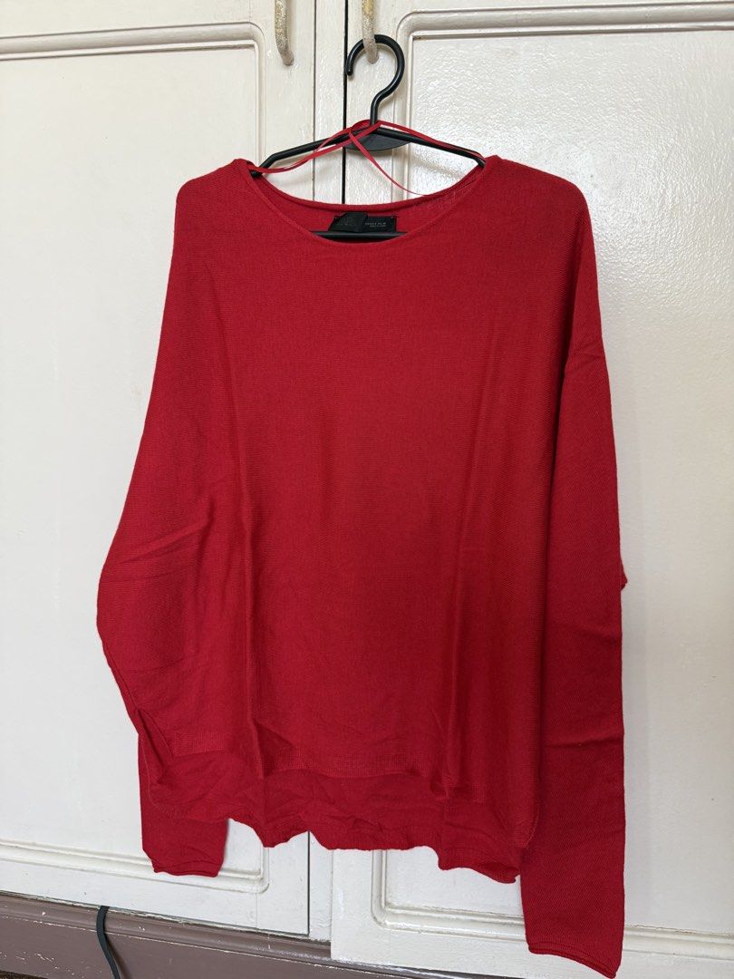 Zara Red Sweater (Category: Longsleeves) located in Manila. Submitted by declutter_with_cmb (Listing ID 1431629509, Image 1). Description: - Zara red sweater - Round neckline - Long sleeves - Made in China - Relaxed fit - Versatile wardrobe piece.