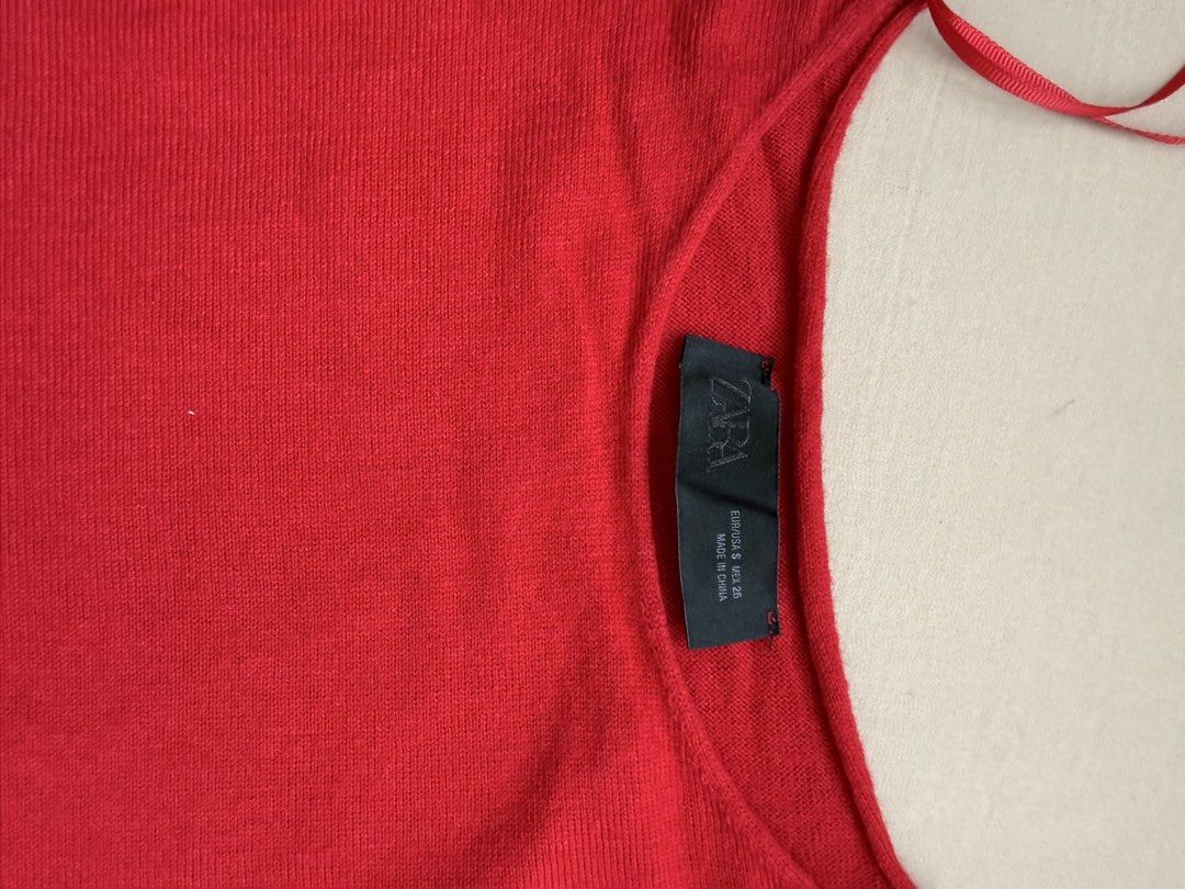 Zara Red Sweater (Category: Longsleeves) located in Manila. Submitted by declutter_with_cmb (Listing ID 1431629509, Image 3). Description: - Zara red sweater - Round neckline - Long sleeves - Made in China - Relaxed fit - Versatile wardrobe piece.