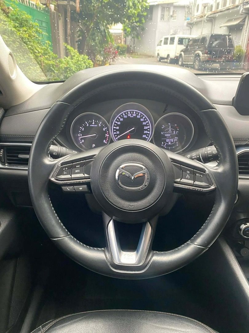 2017 Mazda Cx-5 Pro (Category: Used Cars) located in Pasig City. Submitted by mad_cars (Listing ID 1431856000, Image 1). Description: 2017 MAZDA CX-5 PRO 2.0L AUTOMATIC TRANSMISSION ₱675,000 Machine Gray 61tkms mileage Automatic Transmission 1 ending plate 2.0L Gasoline Engine Leather Seats Power Adjustable Driver Seat Push Start Button Keyless Entry Dual-Zone Automatic Climate Control Touchscreen Infotainment System Bluetooth Connectivity Multif