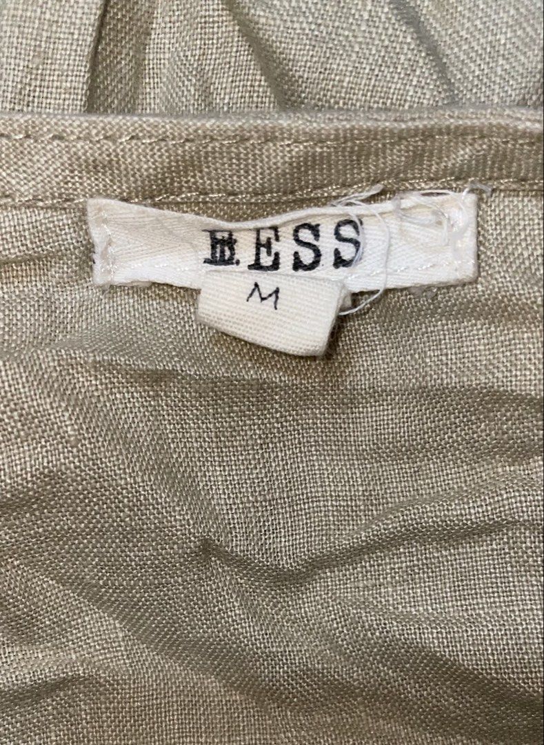 🇺🇸 BESS NY Beige 100% Linen Button-Down Short Sleeve (Category: Dresses) located in Makati City. Submitted by single_mum (Listing ID 1431991883, Image 3). Description: Bought this in USA Bust: 20“ when laid flat Small medium Above the knee Brand: BESS (New York) Size: Medium Material: 100% Linen Color: Oatmeal / Natural Beige Features: • Classic button-down front with dark contrast buttons. • Breathable, high-quality 100% linen fabric. • Short 