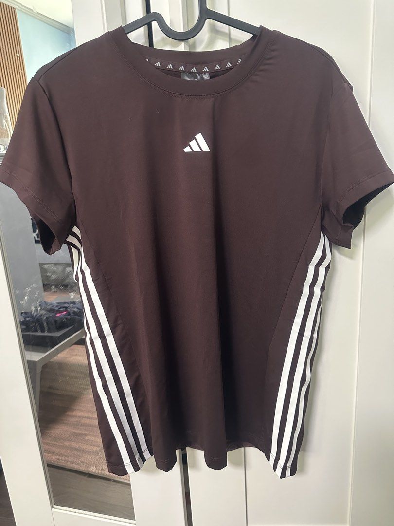 Adidas Hyperglam Training Tee (Category: Activewear) located in Quezon City. Submitted by chiill (Listing ID 1431842007, Image 1). Description: - Adidas Hyperglam Training Tee - Brown color - Adidas logo on chest - slim fit -once lang po nagamit .