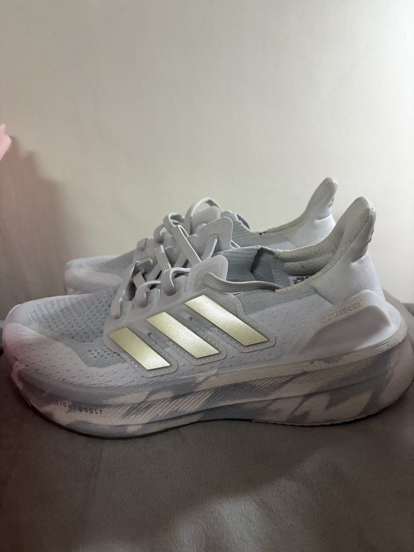 Adidas Ultraboost Running Shoes (Category: Sneakers) located in Cebu City. Submitted by declutterie13 (Listing ID 1431856991, Image 1). Description: Bought for: 10,000 Only used twice - Adidas Ultraboost running shoes - White and gray color scheme - Features the iconic three stripes - Light boost sole - Designed for running .