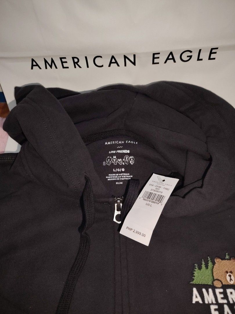 American Eagle Line Friends Hoodie (Category: Coats, Jackets and Outerwear) located in Taguig. Submitted by rtk06 (Listing ID 1431958968, Image 2). Description: - American Eagle hoodie with Line Friends design - Black color - Zip-up front - Hooded - Kangaroo pocket - American Eagle logo on sleeves - Bear graphic on chest - Original price: PHP 2,599.00.