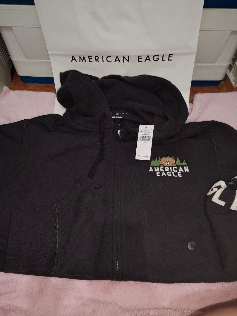 American Eagle Line Friends Hoodie (Category: Coats, Jackets and Outerwear) located in Taguig. Submitted by rtk06 (Listing ID 1431958968, Image 1). Description: - American Eagle hoodie with Line Friends design - Black color - Zip-up front - Hooded - Kangaroo pocket - American Eagle logo on sleeves - Bear graphic on chest - Original price: PHP 2,599.00.
