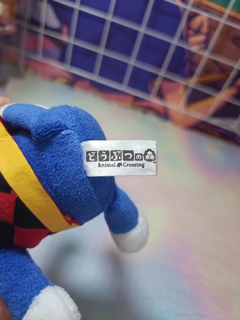 Animal Crossing Rover Plush Toy (Category: Plushies & Soft Toys) located in Paranaque City. Submitted by niropa (Listing ID 1431804002, Image 3). Description: - Adorable Rover plush toy from Animal Crossing. - Features a blue cat design. - Includes a red and black diamond pattern shirt. - Comes with a yellow collar and white paws. - Made by San-Ei Co., Ltd. - Officially licensed by Nintendo. - Includes the original tag..