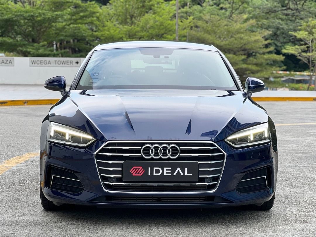 Audi A5 Sportback 2.0 TFSI S tronic Design (A) (Category: Used Cars) located in Singapore. Submitted by idealauto (Listing ID 1431894704, Image 2). Description: Vehicle Features 4 cylinder in-line 16 valve turbocharged, 187bhp, transmission 7 speed (a) S-tronic, torque 320 Nm, acceleration 7.3s (0-100 km/h), top speed 240 km/h Accessories Reverse camera,electric park brake,multi function steering wheel, keyless entry, keyless engine start, multi-